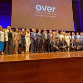 Convention al Lingotto con persone sul palco