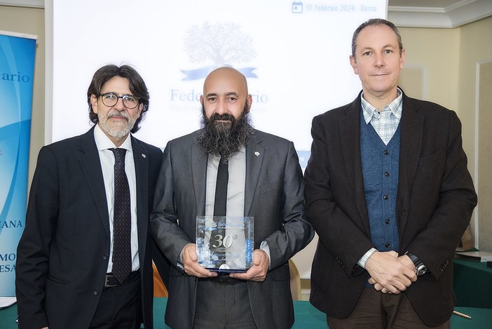 Domenico Iellamo (al centro) con Alessandro Franco (a sinistra) e Nicola Patrizi