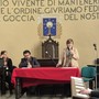 La moderatora Alessandra Trotta (in piedi), introduce la presentazione del progetto, assieme a Davide Rosso e Valeria Lucenti