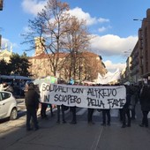 foto d'archivio e locandina corteo 14-1