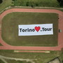 “Torino love le Tour”, al campo sportivo della Caserma Porcelli l'immensa scritta saluterà l'arrivo della corsa gialla [VIDEO]