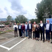 visita a cantiere con persone in posa