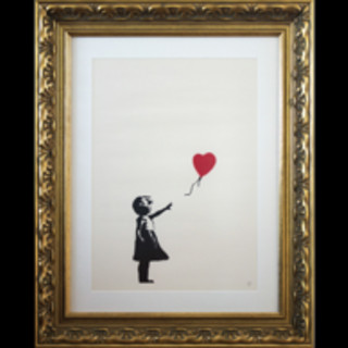 Rubano stampa 'Ragazza con Palloncino' di Banksy, incriminate 2 persone